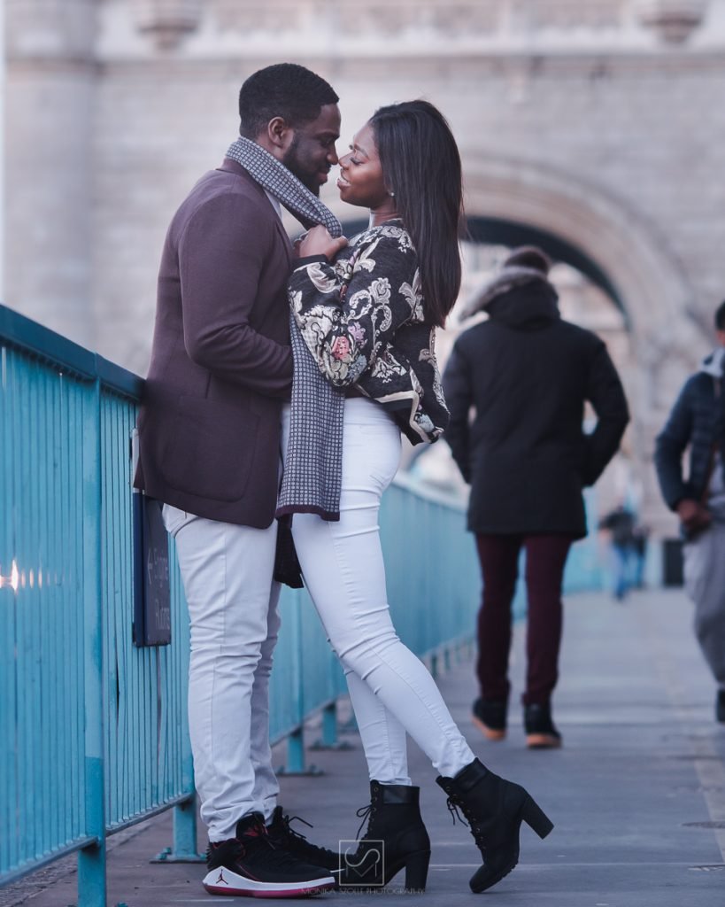 engagement couple standing on the London Bridge