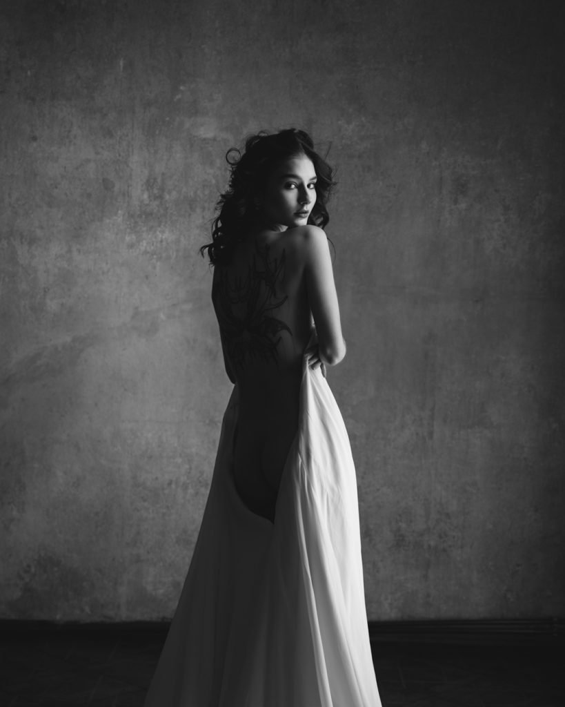 white sheet boudoir photoshoot