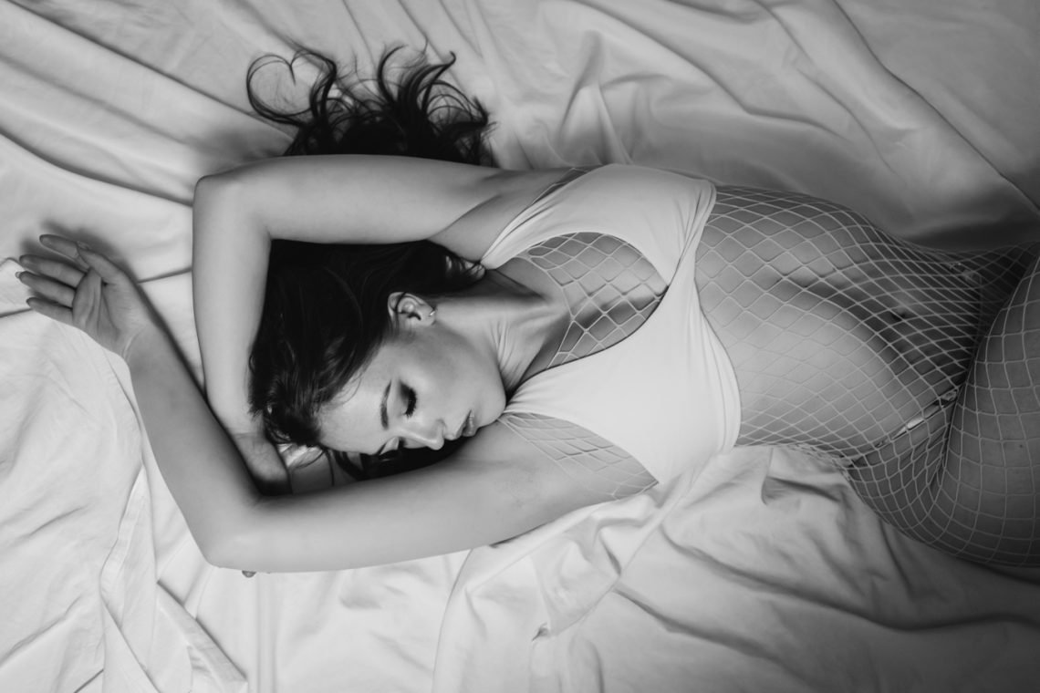 white sheet boudoir photoshoot