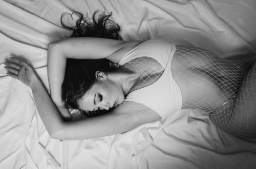 white sheet boudoir photoshoot